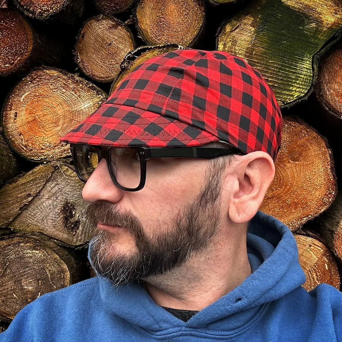 Tomas wearing a home-made cycling cap.